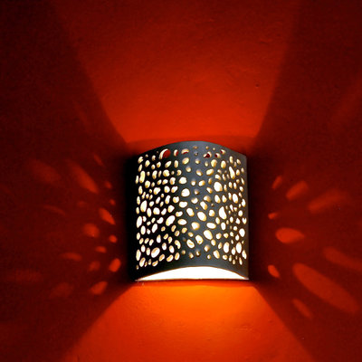 Arbotante calado irregular